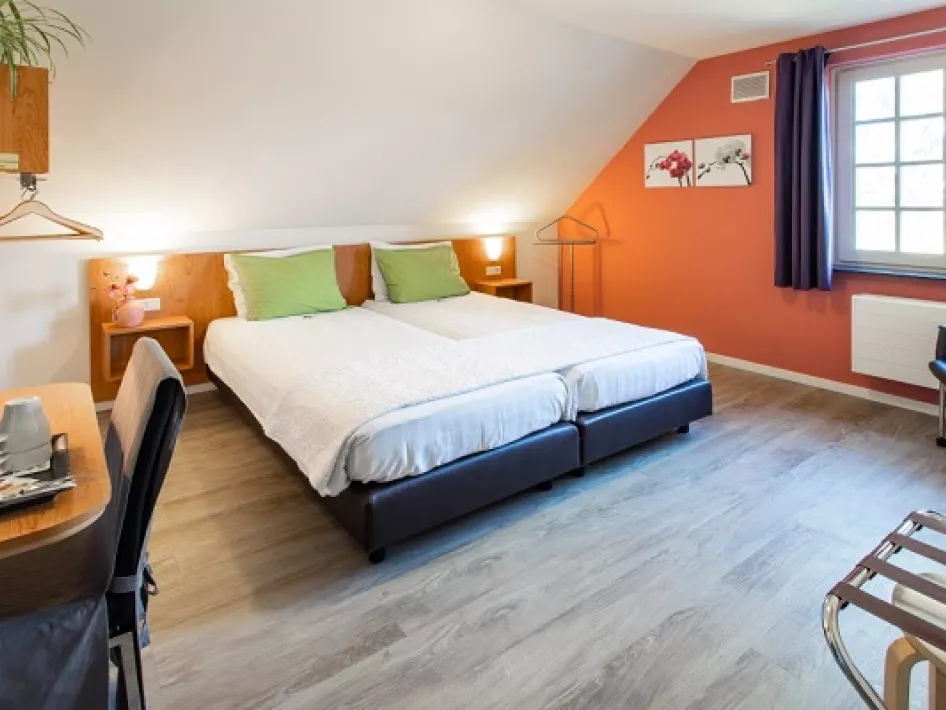 Een van de kamers met tweepersoonsbed van B&B SpraelandhofKamer Bed and Breakfast Spraelandhof 