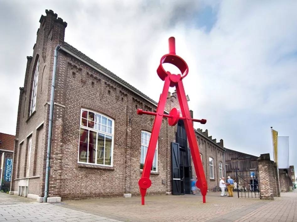 The Cuypershuis Roermond seen from outside with the big red compass in the foreground