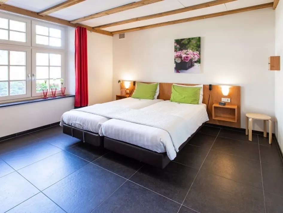 Slaapkamer van groepsaccommodatie Spraelandhof 