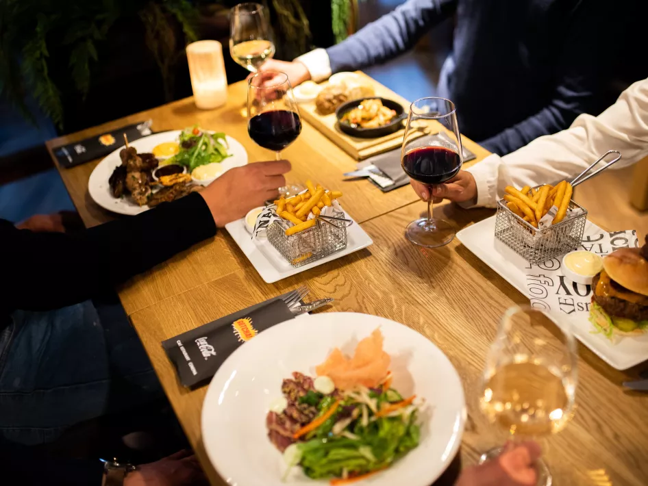 Plates with food at cinema in Weert