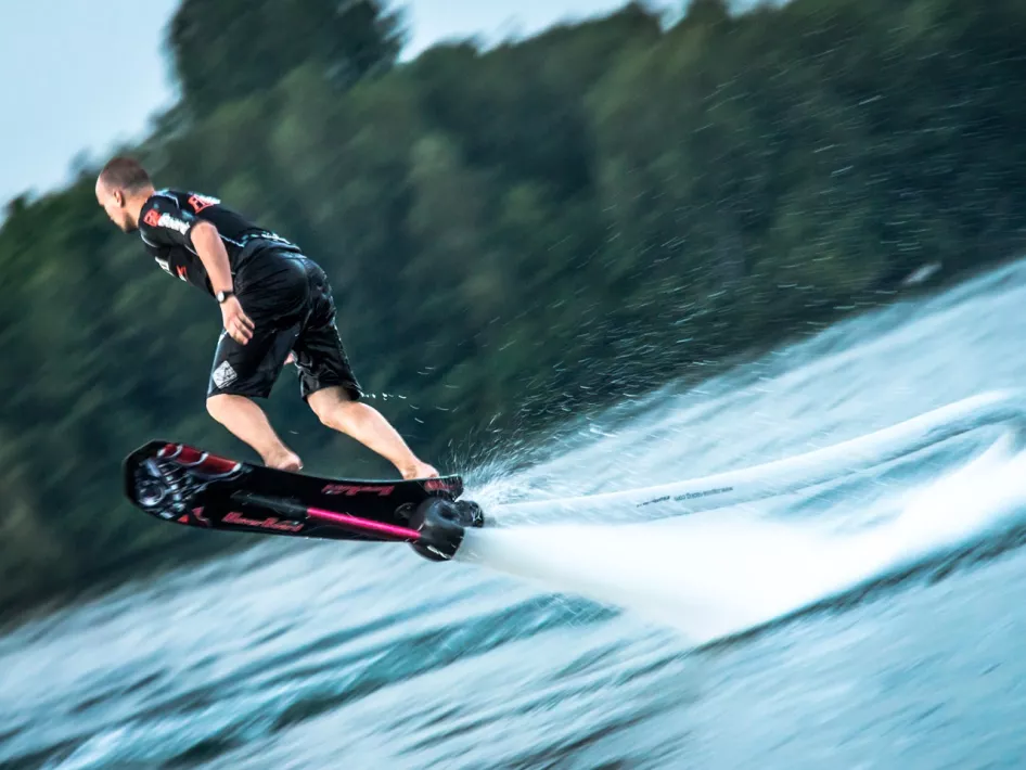 Man takes off from the water with his flyboard