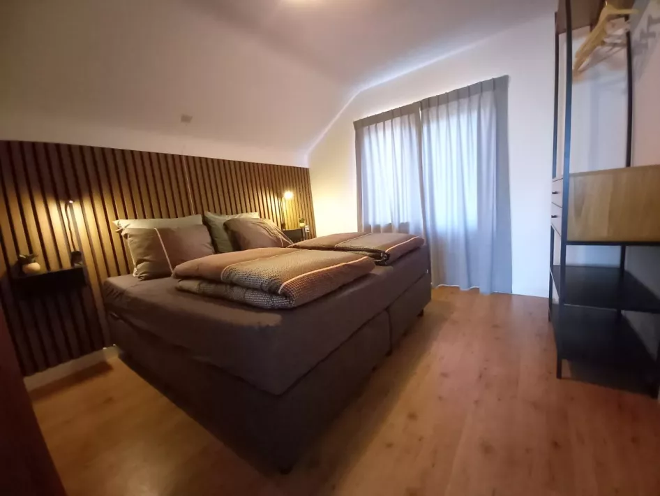 de slaapkamer van Vakantieappartement de Torenvalk in Grashoek