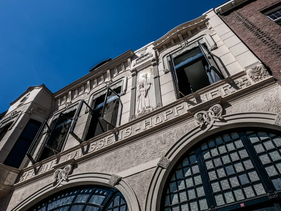 Facade of Boutique Hotel N10 in Roermond with Art Nouveau details and open windows