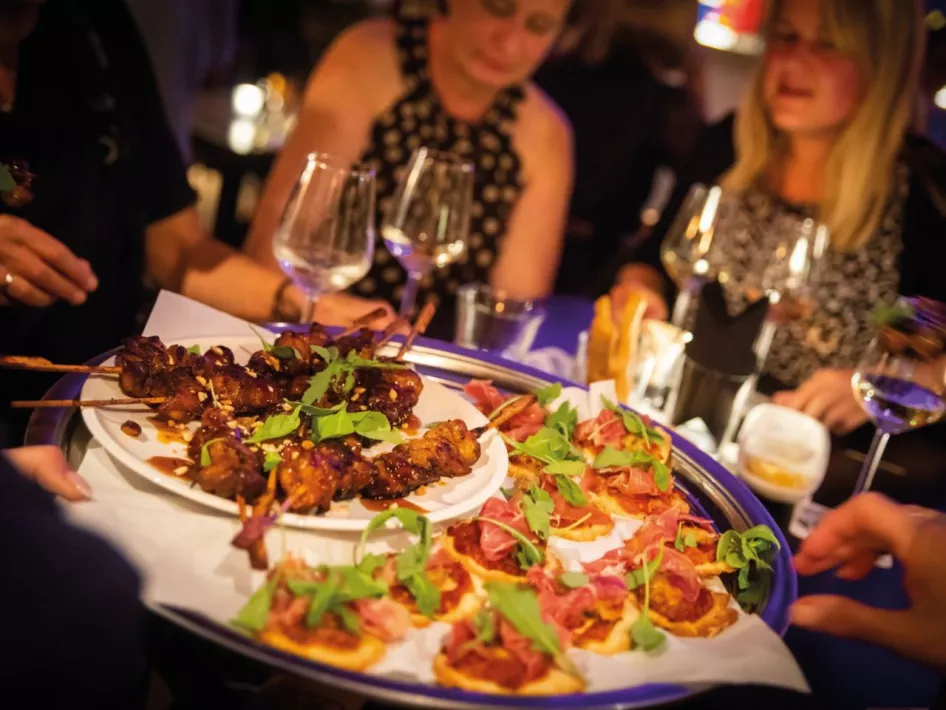 Tasty snacks beautifully presented on a plate served at the Soos in weert
