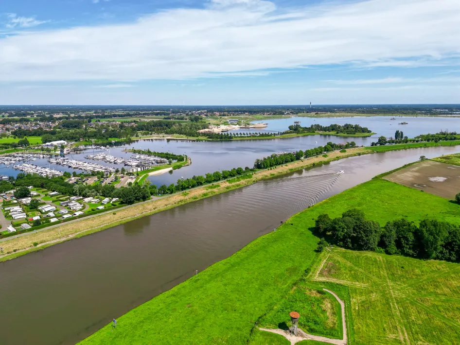 View over the Maas, marina and green riverbanks near Ohé en Laak