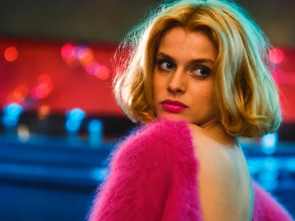 Close-up van een vrouw uit een filmbeeld met de tekst Filmcollege: De kracht van filmmuziek van ECI Cultuurfabriek.