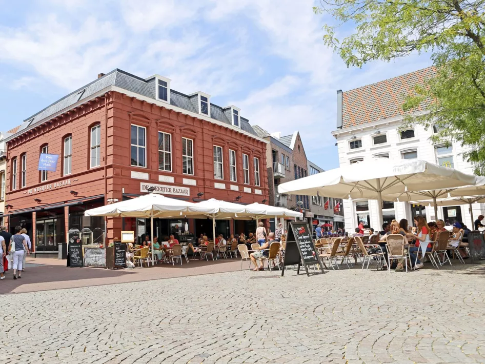 The premises of Grand Café de Weerter Bazaar with the cosy terrace in the foreground
