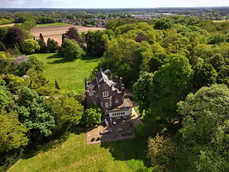 Castle Aerwinkel photographed by a drone with the castle garden in the foreground