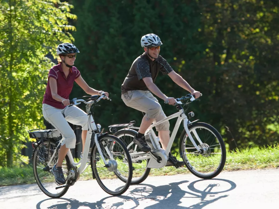 Couple together on a bicycle