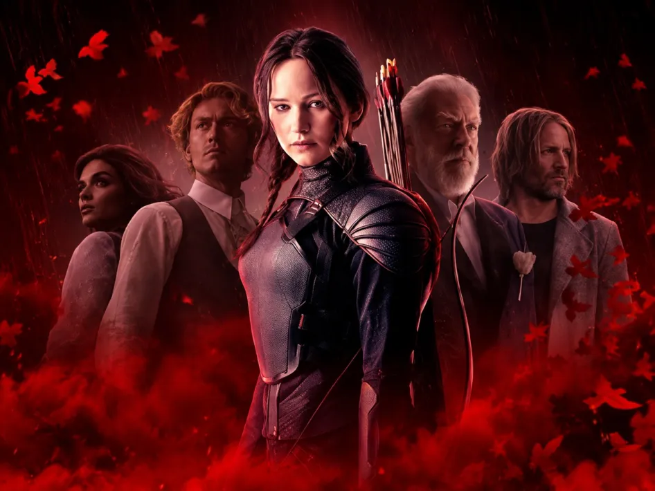 Promotiebeeld van The Hunger Games met vijf personages uit de filmreeks tegen een rode achtergrond.