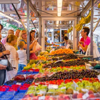 People buying fresh fruit and vegetables at the weekly market Weert.